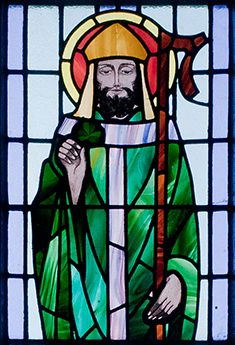 St. Patrick depicted in a stained glass window at St. Benin's Church, Ireland