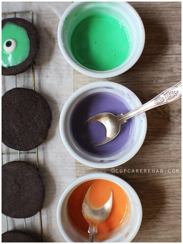 Colored royal icing to make melted monster cookies for Halloween!