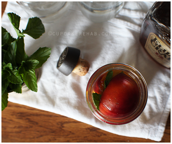 Recipe for mint julep peaches: peach halves canned in a light syrup with bourbon and mint. #sweetpreservation
