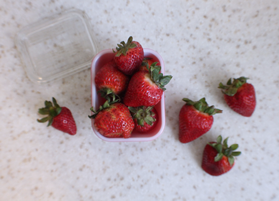 Strawberries for ricotta mini-bundt cakes.