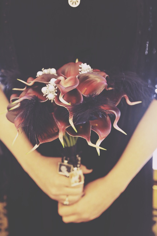 Red/plum Calla Lily bouquet with black feathers by LilyOfAngeles on Etsy | A New York City Hall wedding (Photo by Janai McNeil of Pixel Perfect Photography) #bridesinblack #offbeatbrides #nycbrides #offbeatbouquetideas