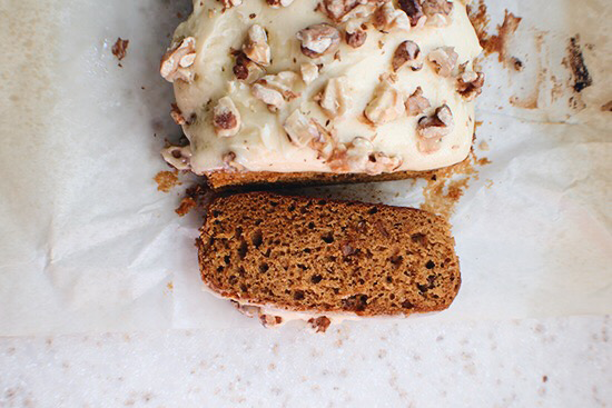 Pumpkin ginger cake with maple frosting and toasted walnuts.