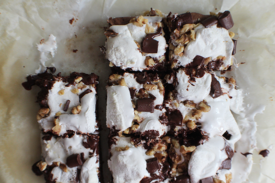 Rocky road brownies; covered with homemade marshmallows, chocolate chunks and walnuts.